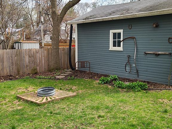 Back yard including fire pit.