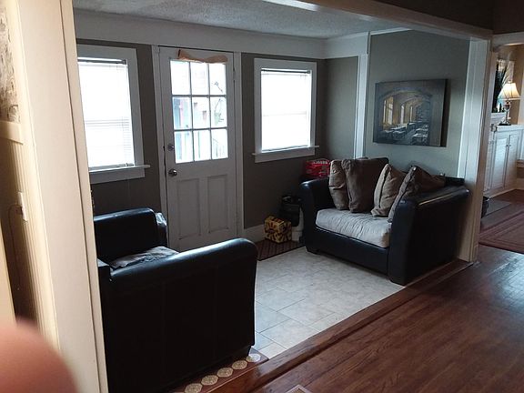 Extra space off dining room. Door leads to driveway. .