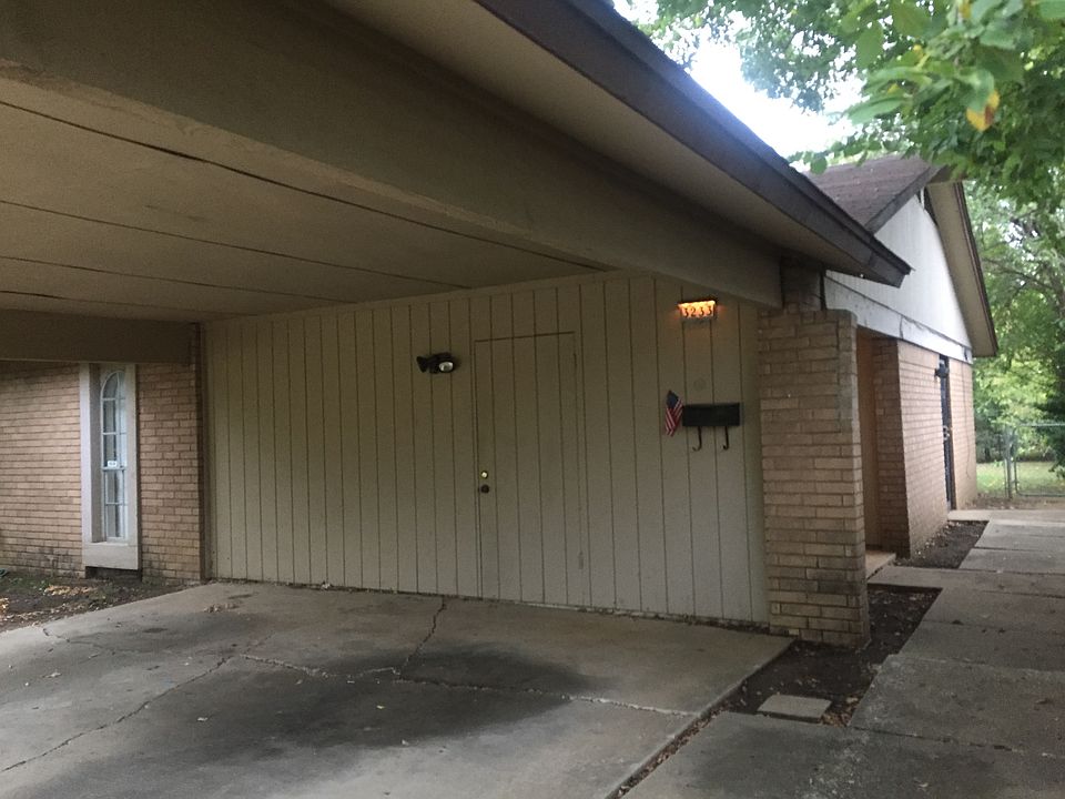 Duplex carport and view from street