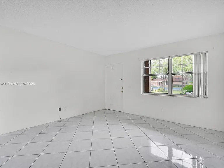 755 NW 104th Ave #104 — Photo 4