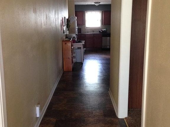 Front entry leading into the kitchen & dining