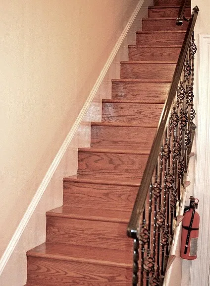Stairs going down to bedrooms