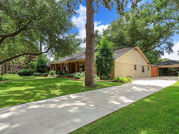 The Driveway was recently replaced. The 2 car garage features epoxy floors, dbl pane windows, radiant attic barrier and fully sheet rocked. Beautiful landscaped yard!