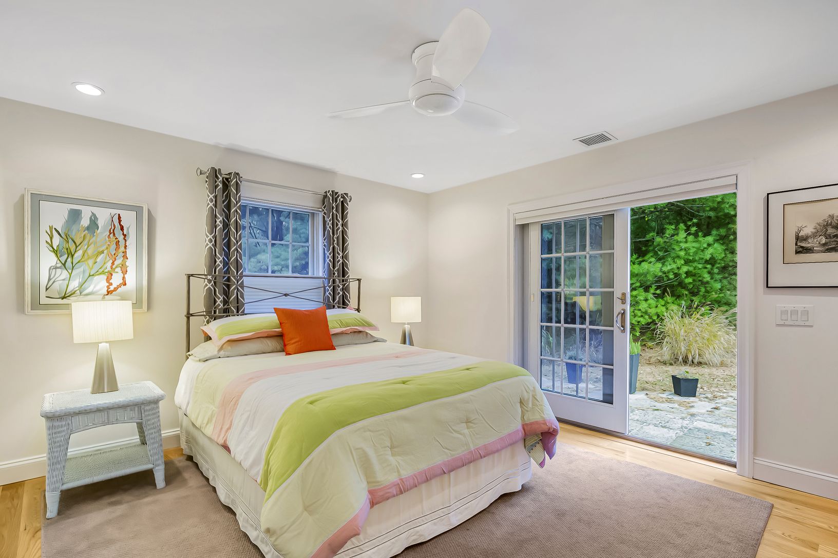  2nd bedroom with sliding door access to patio and pool