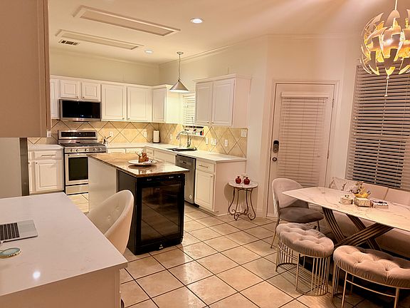 Kitchen, Dining room area. White quartz countertops, brand new appliances