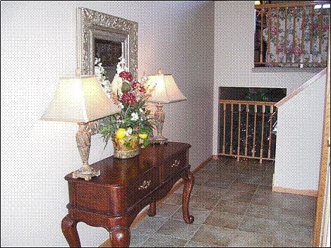 Ceramic front entry with extra room and pizazz!