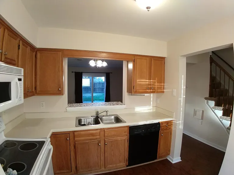 Kitchen looking into living room