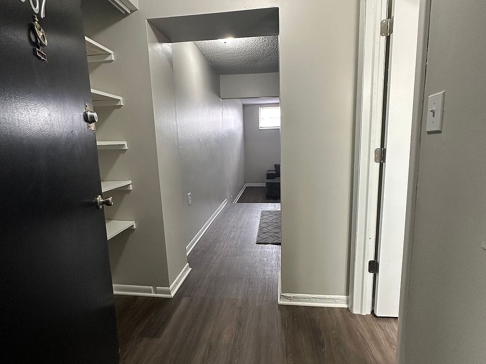 807 entry with new plank flooring and storage.