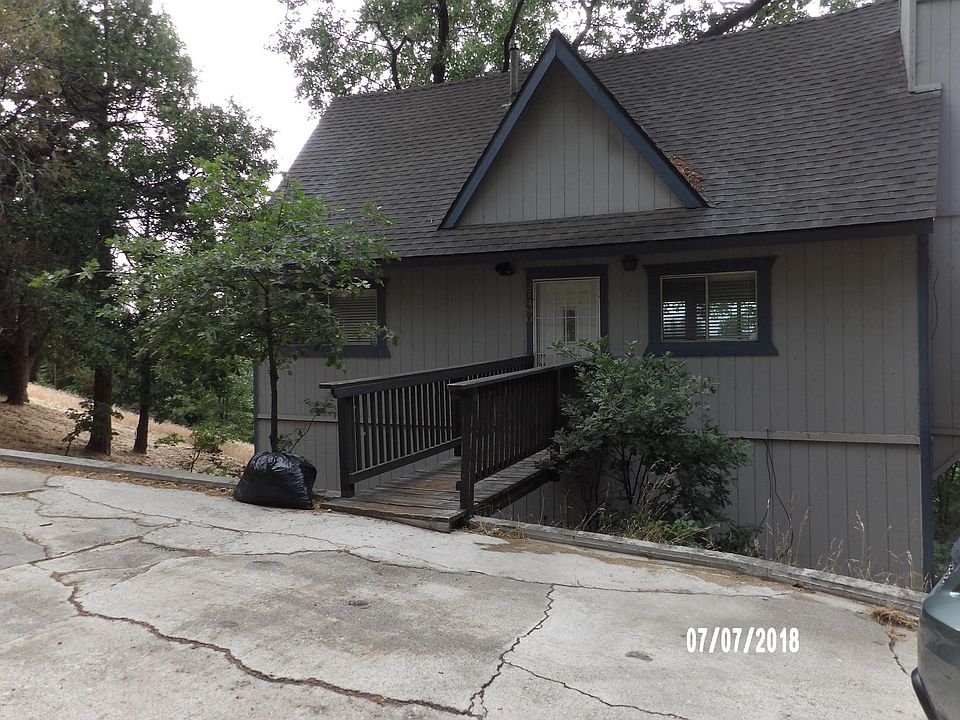 FRONT OF HOME WITH OFF STREET PARKING.
