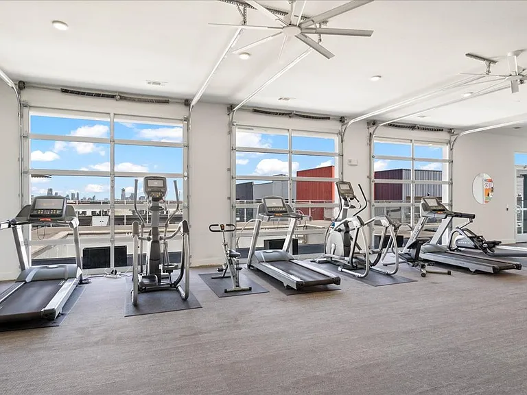 Beautiful exercise room with view of the city