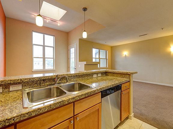 Kitchen Overlooking Breakfast Area and Living Room