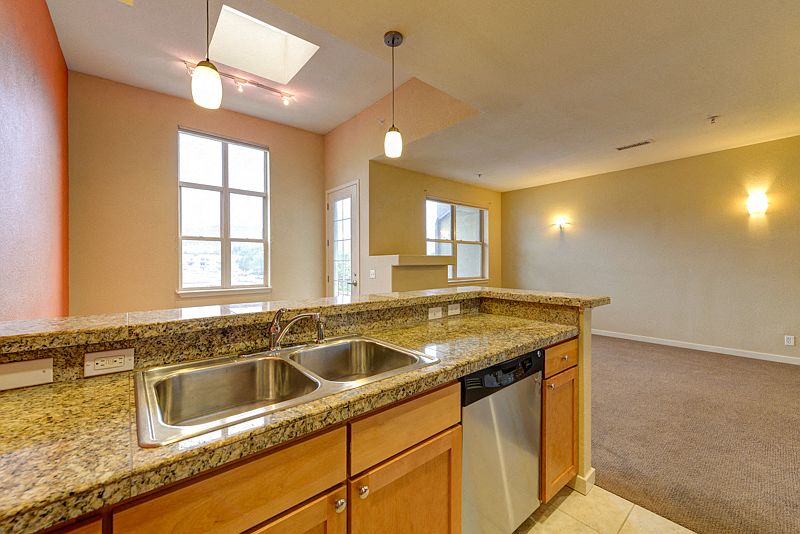 Kitchen Overlooking Breakfast Area and Living Room
