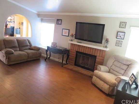 Living Room with Fireplace and Vaulted Ceilings