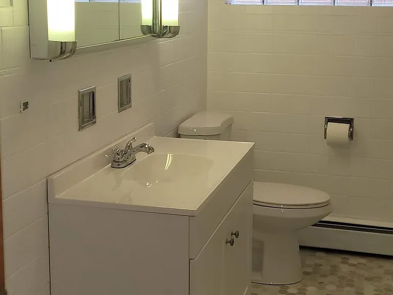 brand NEW floor, toilet, vanity. freshly painted. Full tub. CLEAN, CLEAN, CLEAN