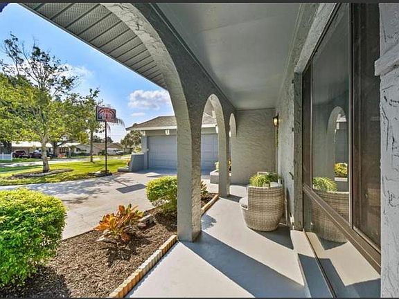 front entrance and 2 car garage