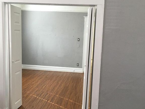 Living room looking into bedroom