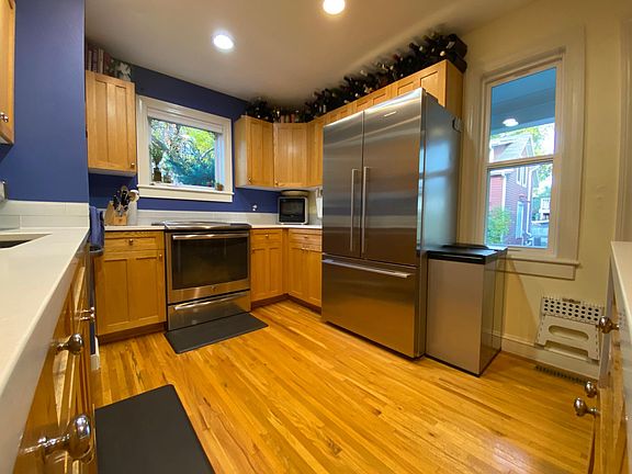 All stainless appliances, oversized sink, induction range, quartz countertops.