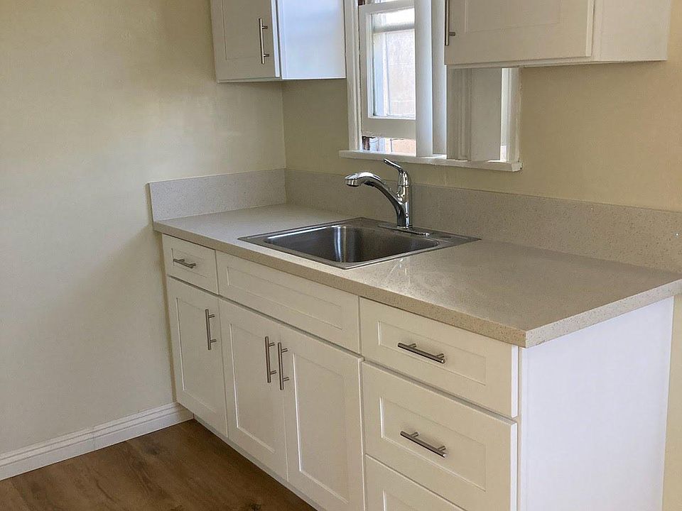 Remodel kitchen with new cabinets and sink