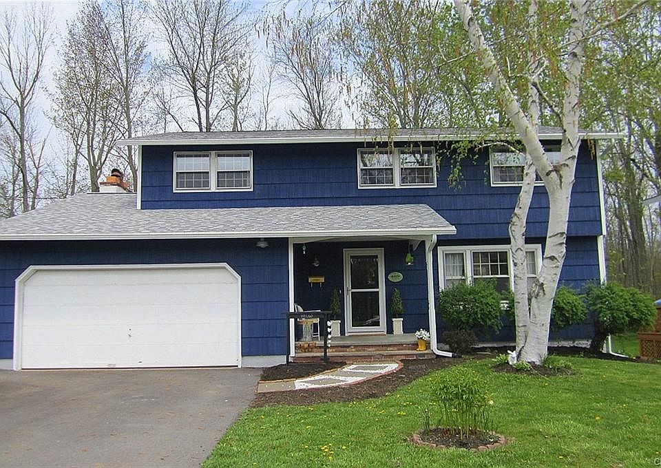 The very sharp, freshly painted exterior, really sets this house apart from all the others in the neighborhood!  What a cool color!!