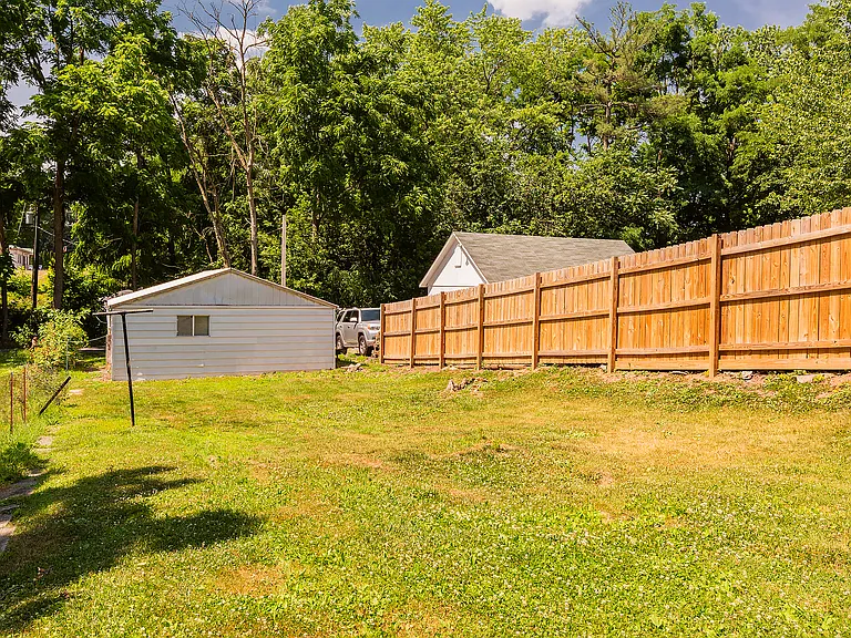 Shared backyard with 201 W High St. Some photos are mirror opposite from 201 W High St both finished the same inside.
