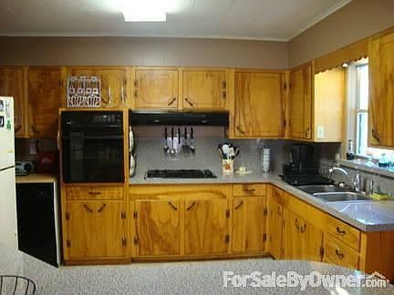 kitchen
						:
						gas stovetop, built in oven, dishwasher, refrigerator & new counter tops