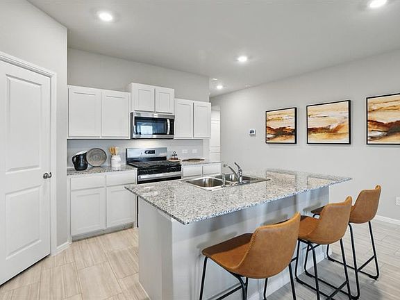 Kitchen- All Home and community information, including pricing, included features, terms, availability and amenities, are subject to change at any time without notice or obligation. All Drawings, pictures, photographs, video, square footages, floor plans, elevations, features, colors and sizes are approximate for illustration purposes only and will vary from the homes as built.