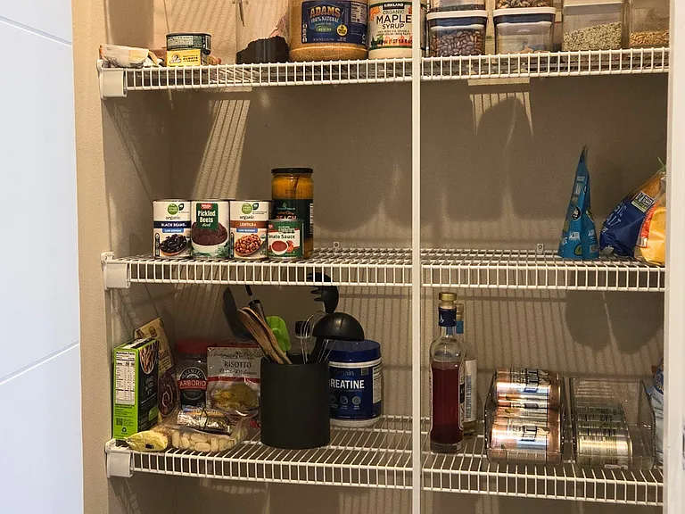 Your large, walk-in pantry holds kitchen gadgets and supplies