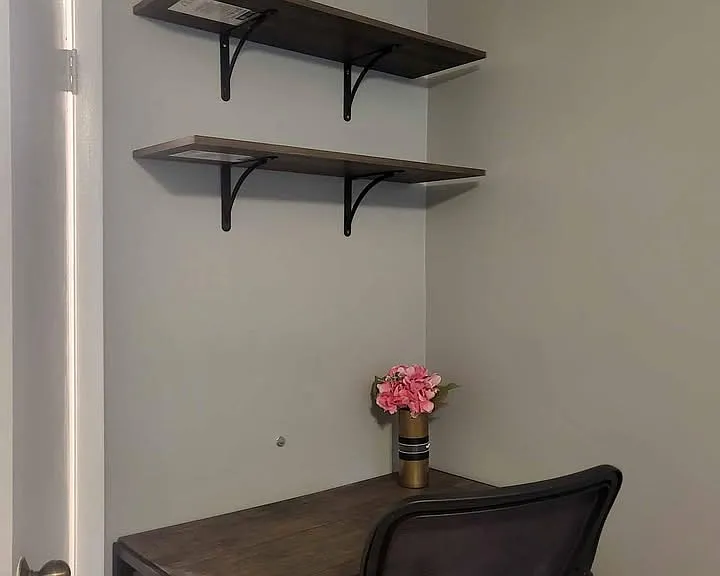 Work area. Study table, ergonomic chair, shelves for books and misc.
