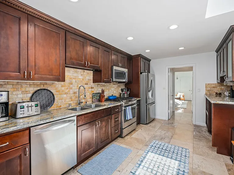 8221 Delgany Ave — Photo 17