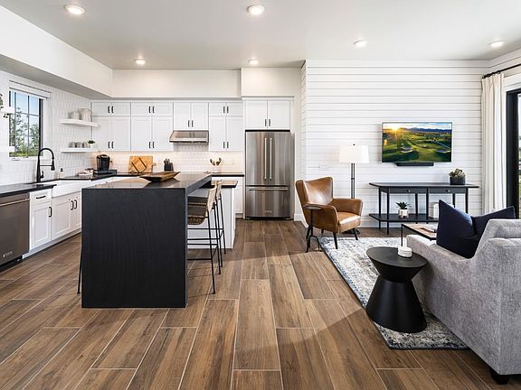 Open floor plan with view of the golf course