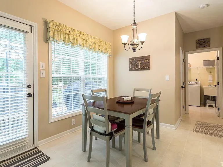 Breakfast Nook, Door to Deck, Hallway to 1/2 bath, Laundry, & Garage