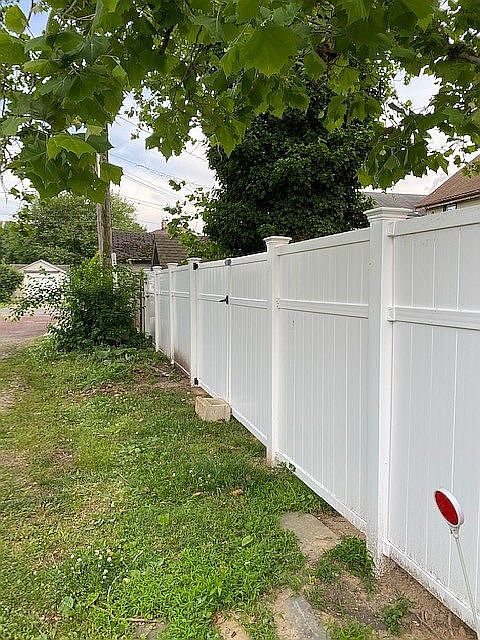 Vinyl fence with double-gate