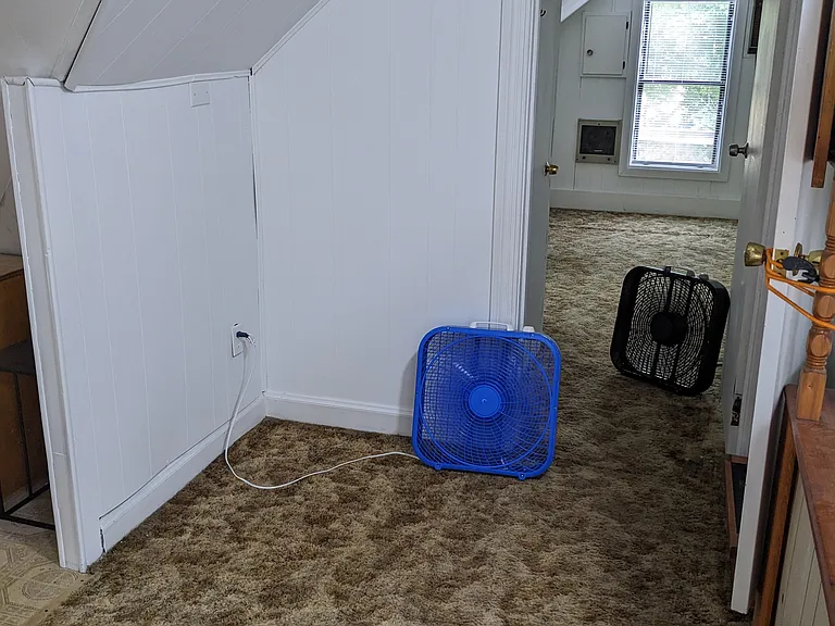 Third floor, office/playroom with a convenient half bathroom