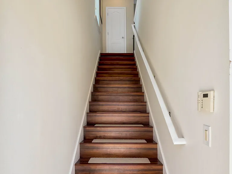 Apartment entrance, wood stairs