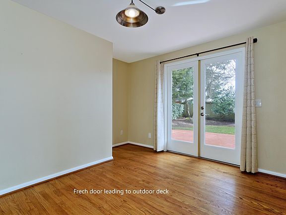 Dining area with french door leading to outdoor deck