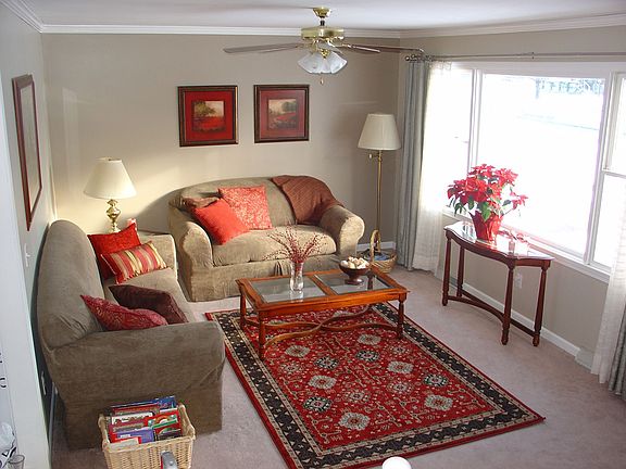 Living room - note crown molding and fan