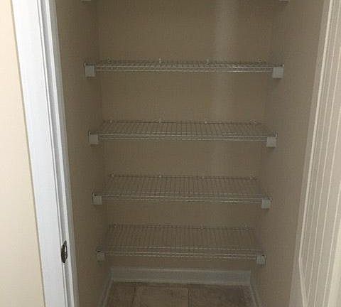 linen closet in master bath