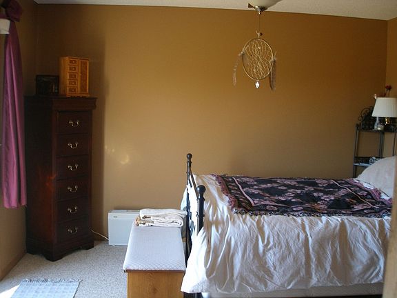 Master Bedroom with Master Bath. Large Soaking Tub, Bedroom walks out to Deck 