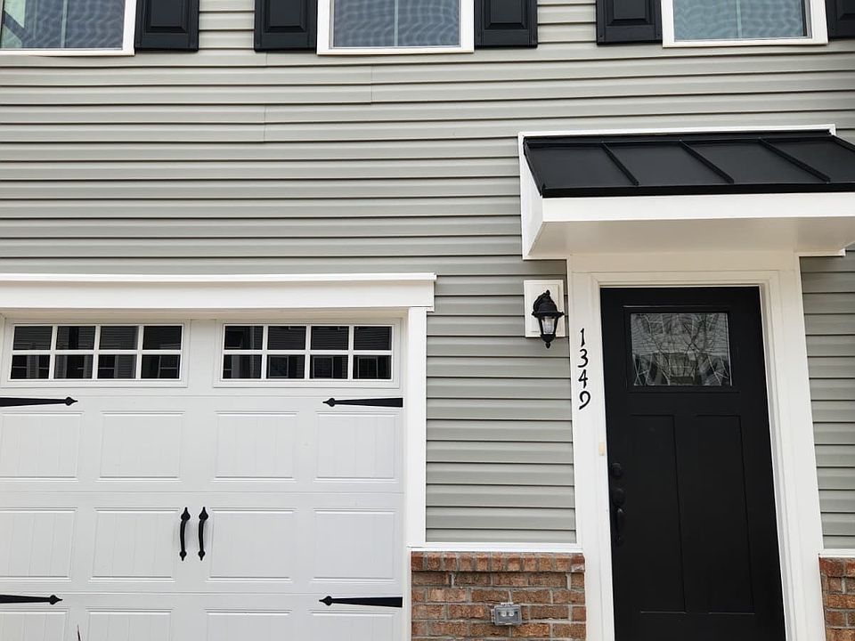Main Entrance + Garage