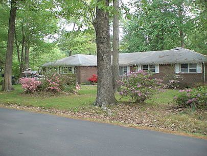 Front of home facing Thalia dr.
						:
						House Front