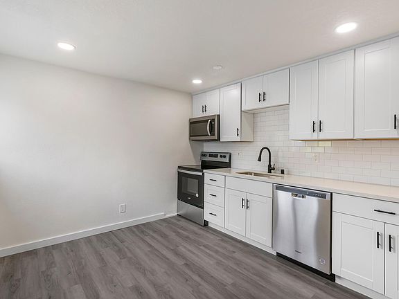 Lots of cabinets for storage.