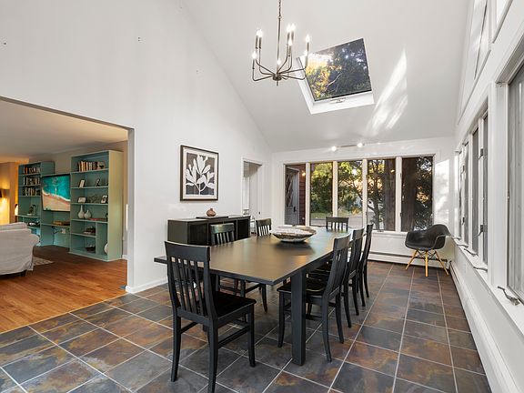 There is amazing natural light in this room with the numerous windows.
