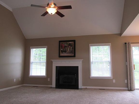 Living Room
						:
						Gas Fireplace and cathedral ceilings