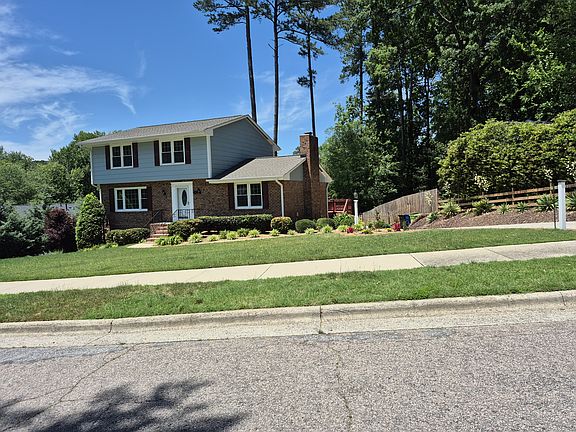 Nice walkway that has solar lighting and a Post light. The rear yard is completely fenced and has all new fencing. The end of the driveway has stairs to the rear deck that leads to the family room and kitchen making it easy to bring in the groceries.