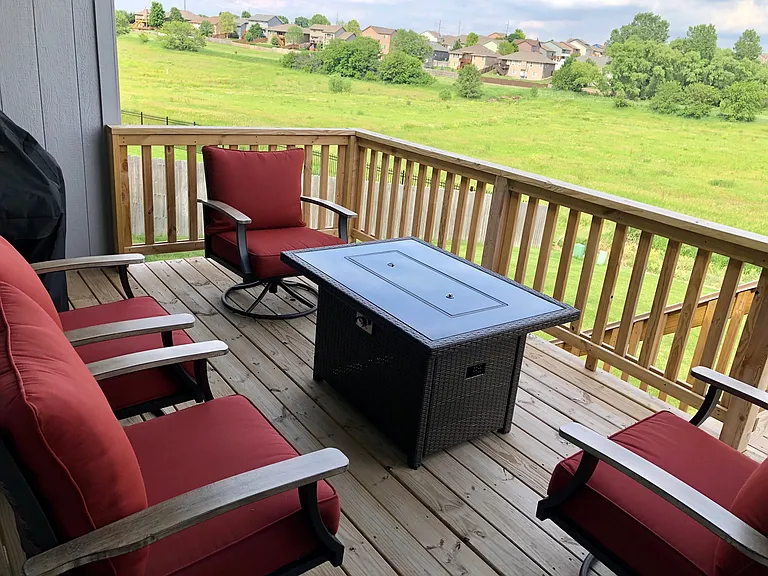 Deck chairs, firetable, and grill