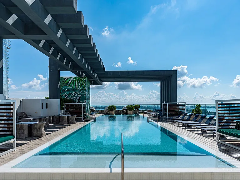 Take a dip in your world-class swimming pool.