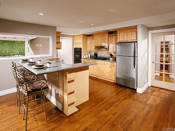 4th image of 8507 Remmet Ave