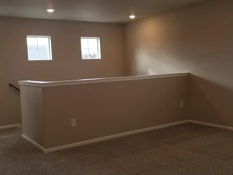 Windows all around the loft area. Nice place to relax and watch TV.