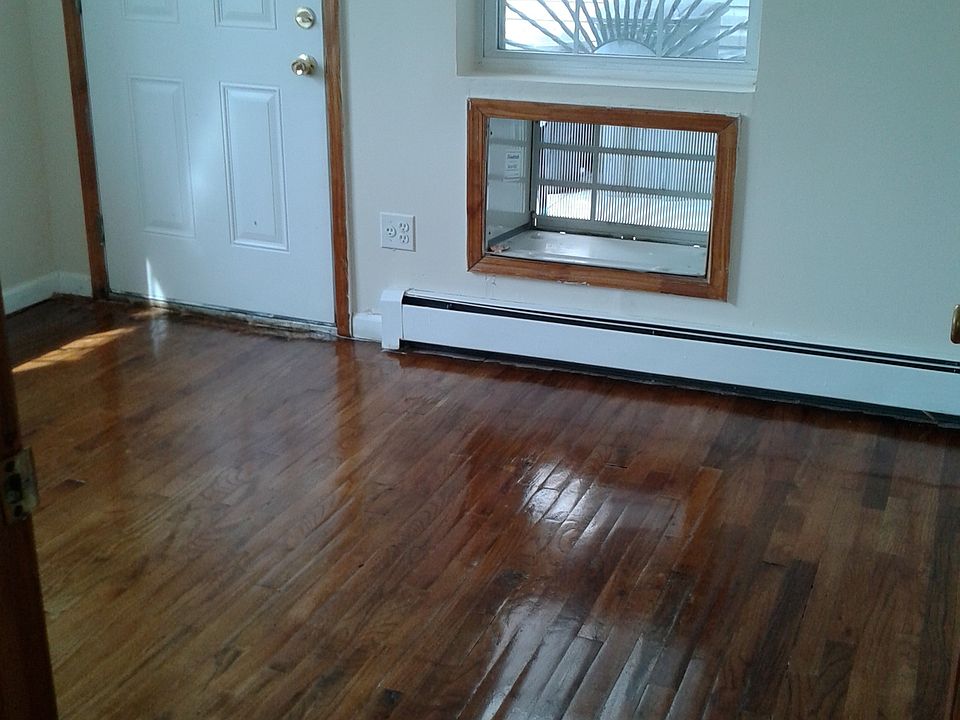 left bedroom with door to back