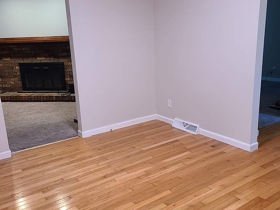 Dining room or office looking into family room and foyer.